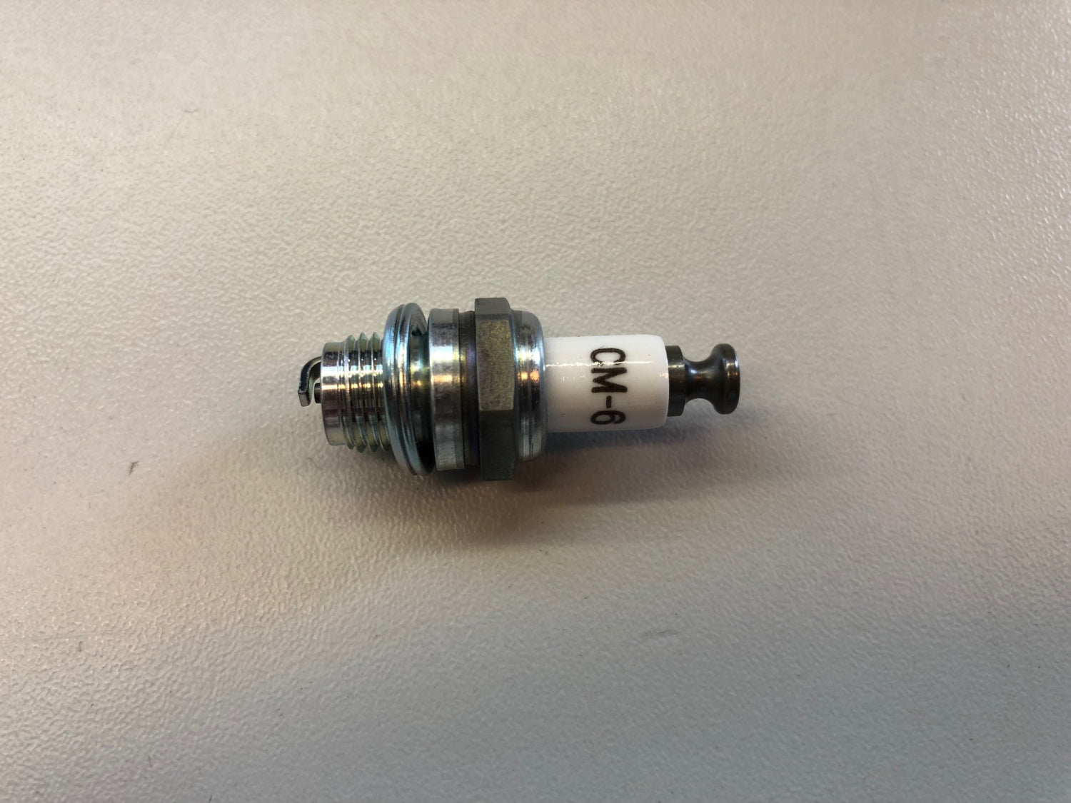 OS CM-6 / NGK tændrør.